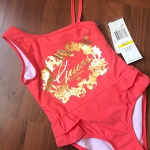 Guess girl’s coral and gold swimwear